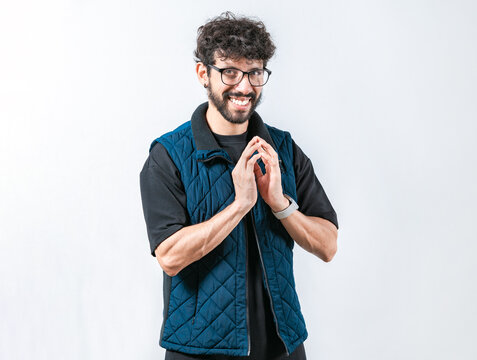 Cunning young man rubbing hands making plan isolated. Person evil rubbing hands planning