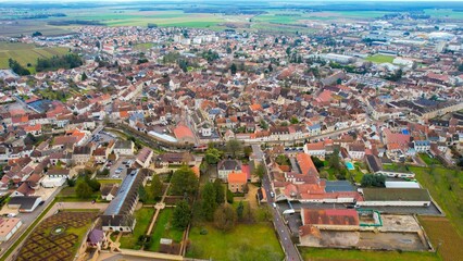 Obraz premium Aerial of the old town of Beaune in France on a cloudy morning in early spring.