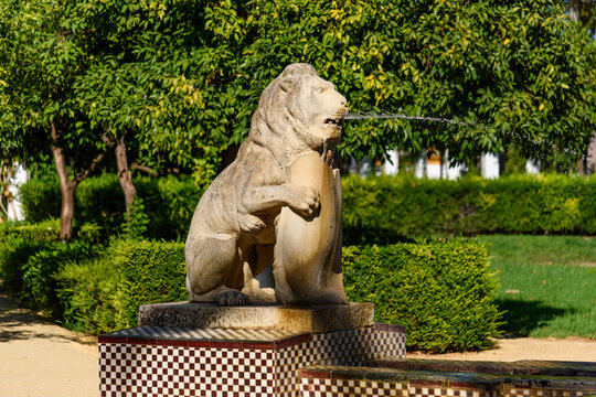 Sevilla, Spain - August 01, 2024: Statue at Maria Luisa Park - Seville, Andalusia, Spain. Jardin de los Leones Fountain (Lions Garden) at Maria Luisa Park - Seville, Andalusia, Spain