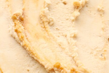 Tasty vanilla ice cream as background, closeup