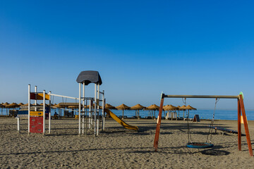 Malaga, Spain - August 06, 2024: Beach "Playas del Palo" in Malaga, Spain © nedomacki
