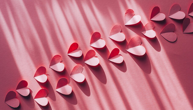 Rangkaian bunga romantis berbentuk hati dari mawar pink, daisy putih, dan krisan pastel di atas latar belakang pink lembut, konsep cinta, valentine, pernikahan, dan kartu ucapan elegan dengan copy spa