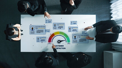 A diverse team holds a crucial business meeting to analyze customer satisfaction metrics, emphasizing feedback review and collaborative strategy development in a contemporary office setting. Trope