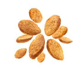 Bread croutons levitate on a white background