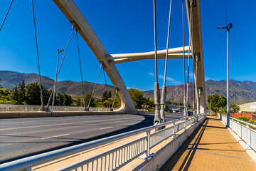 A view across the arch bridge over the Cogmans River in Ashton, South Africa in springtime