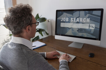 job search or unemployment concept, find your career, man looking at online website with job offers