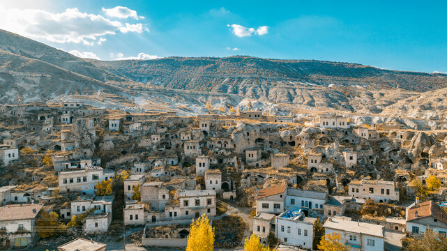 Karain Village, which is shadowed by the drifting clouds of Cappadocia (Kapadokya), creates a fascinating atmosphere with its abandoned structures.