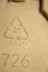 ustainable Natural Cardboard Texture Background with Recycle PAP (paper and plastic) 21 Symbol for Eco-Friendly Packaging, Copy Space, and Green Environmental Balance
