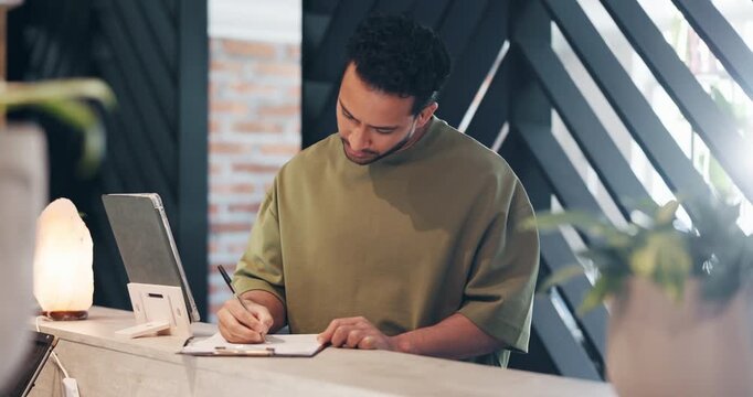 Spa, front desk or man writing on form in lobby, personal details or treatment request document. Clipboard, contact info or person with pen at wellness center, consent protocol or allergy disclaimer