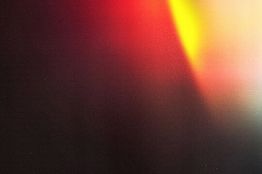 light leaks overlay effect with blurry yellow and red light ,retro film distressed grain noisy texture light leak flare on black background,grunge old film projector lens,abstract colorful background