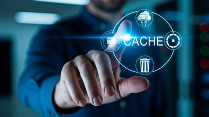  Man's finger pressing on a digital cache icon for the concept of technology and data processing.