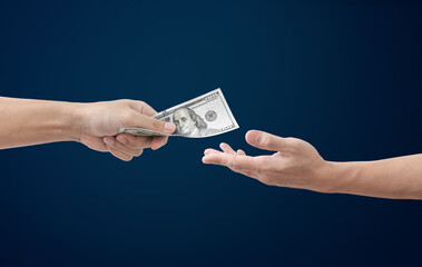 Hand giving and receiving money, isolated on blue background