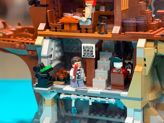 Fototapeta premium Pirate-themed lego scene with characters and wanted poster