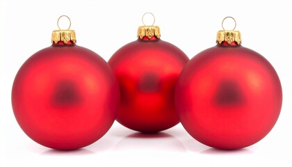 Fototapeta premium Five red Christmas ornaments with gold caps resting on artificial snow in festive holiday composition.