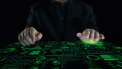 A business professional interacts with a glowing green digital interface, showcasing various data metrics and charts, representing the future of energy and technology integration. Cipher