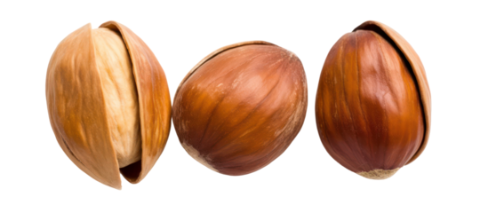 Three piles of hazelnuts pistachios brazil nuts side by side on transparent background
