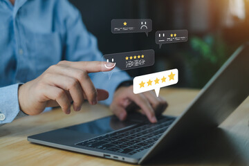 Customer satisfaction feedback rate questionnaire opinion use, businessman using laptop and touching virtual stars for online service rating and customer experience review.