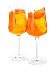 Glasses of refreshing spritzer cocktail isolated on white