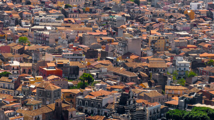 Obraz premium Aerial view of houses and buildings in the city of Catania, Italy. It is the second largest city in Sicily