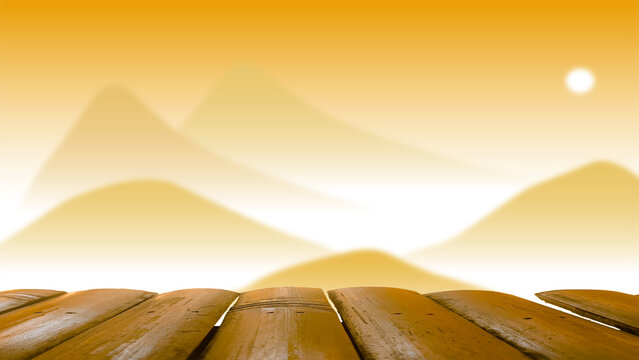 A wooden table with a blurred background of mountains and fog in winter.