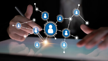 A person engaged with a digital tablet, illustrating the concept of networking and interaction in a virtual space, perfect for business and tech themes. Tessel