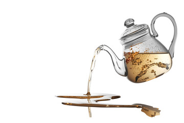 silver ornate teapot pouring light brown tea that splashes onto a reflective saucer, no background svg