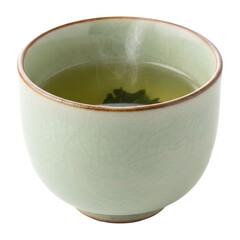 Light Green Ceramic Tea Cup Filled With Steaming Green Tea And A Single Leaf