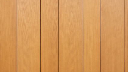 Light brown wood paneling on a wall with vertical boards