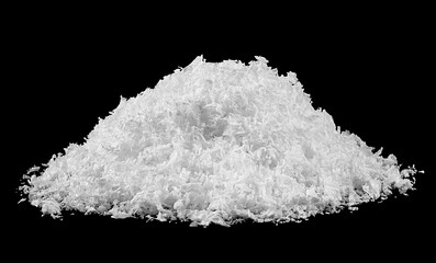 Snow on a black background. Snowdrift backdrop in winter season. Fluffy white snow.