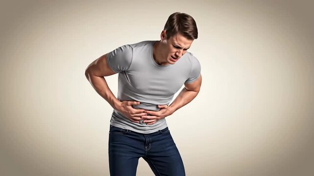 Man Experiencing Severe Stomach Pain Due to Digestive Issues in a Studio Setting