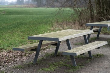 Outdoor picnic table in a green park environment