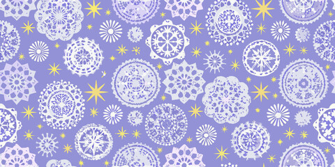A lavender background filled with white and gold floral and star patterns