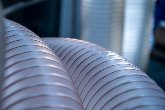 Flexible PUR antistatic suction hose for air conditioning, background flexi hose, industrial ventilation.	