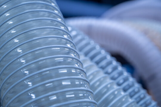 Flexible PUR antistatic suction hose for air conditioning, background flexi hose, industrial ventilation.	