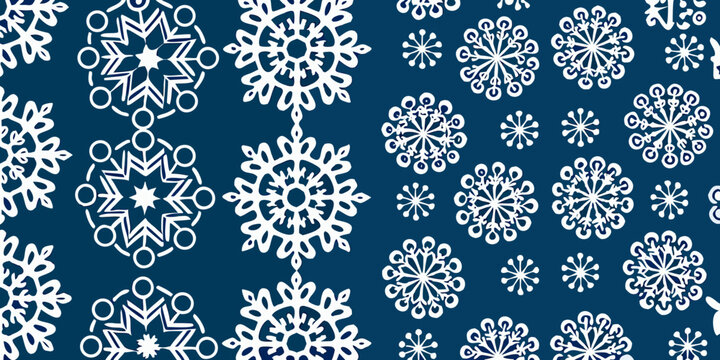 Intricate white snowflake patterns repeat on a dark navy blue background