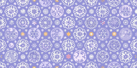Intricate floral and star pattern on a lavender and white background
