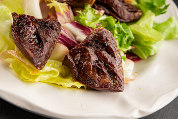 Salad heart turkey roasted giblets poultry meat tasty snack fresh delicious gourmet food table setting rustic food top view copy space