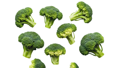 Collection of fresh green broccoli florets and stalks floating or falling against a Transparency background Healthy vegetable food concept