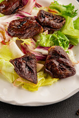 Salad heart turkey roasted giblets poultry meat tasty snack fresh delicious gourmet food table setting rustic food top view copy space