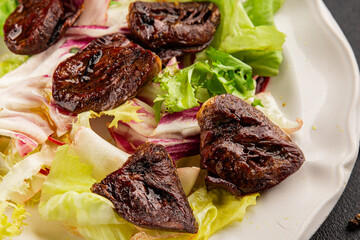 Salad heart turkey roasted giblets poultry meat tasty snack fresh delicious gourmet food table setting rustic food top view copy space