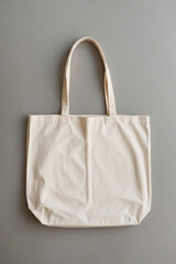 White tote bag on gray background. Eco or reusable shopping bag 