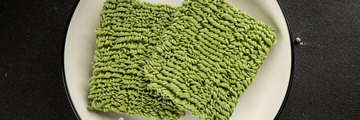 Jade noodles raw green noodles healthy food main course ingredient appetizer fresh delicious gourmet food table setting rustic food top view copy space