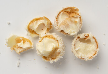 Coconut candies isolated, brokencoco balls set. White truffle ball, indian ladoo or laddu pieces