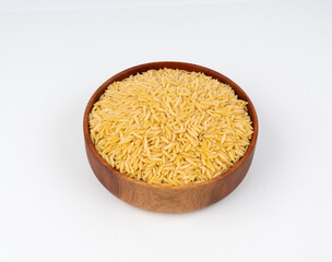 Raw orzo pasta, risoni or kritharaki pile
