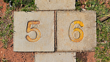 Numbers five and six on a concrete floor, Rio de Janeiro, Brazil