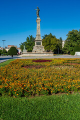 Monument of Liberty in Ruse with colorful flower garden