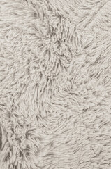 Close-up of a soft, fluffy, and textured Cloud Dancer fabric background