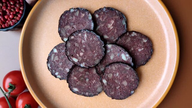 Black blood pudding, grilled pork sausage cooked for dinner. Blood pudding as a food background for your design