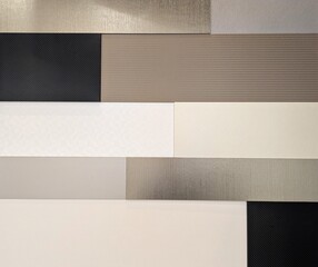 複数のニュートラルカラーとテクスチャを組み合わせたモダンな幾何学デザイン背景