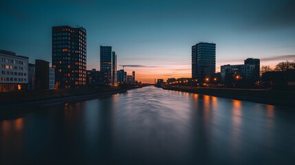 Fototapeta premium Elbe River cityscape at dusk with long exposure water